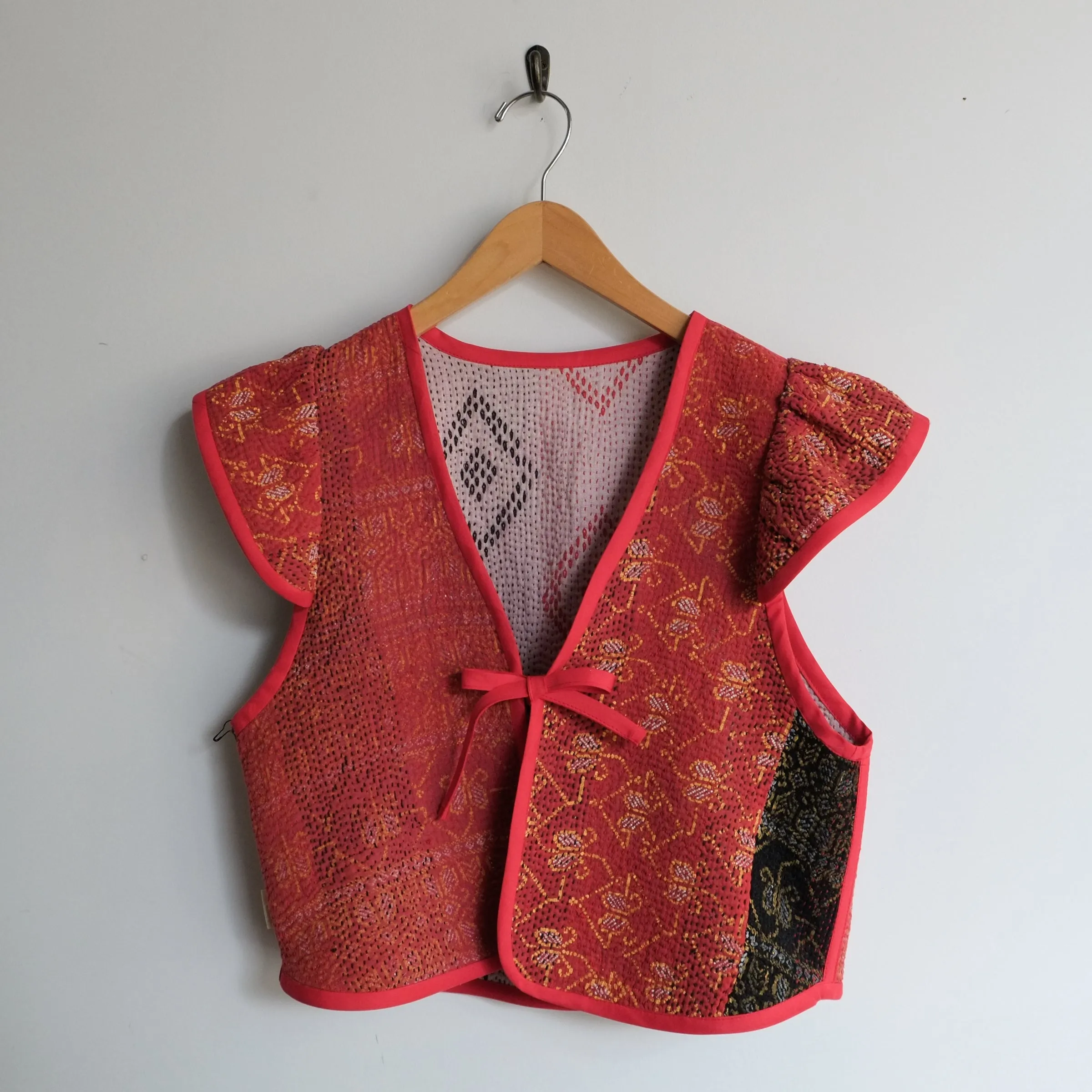 Amelia Flutter Sleeve Vest Black and Red Embroidered Diamonds Red Trim S063